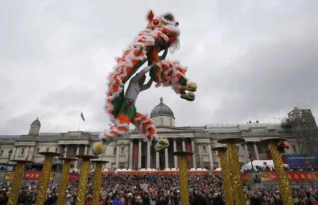Participants perform the Dance of the Lion as they take part in an event to celebrate the Chinese Lunar New Year of the Rooster in London, Britain, January 29, 2017. (Photo by Neil Hall/Reuters)