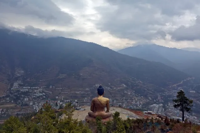 The Buddha Dordenma statue overlooks the town of Thimphu, Bhutan, April 16, 2016. (Photo by Cathal McNaughton/Reuters)