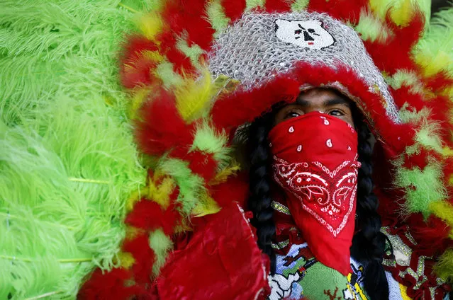 Members of the Seminole Warriors Mardi Gras Indians perform at the New Orleans Jazz and Heritage Festival in New Orleans, Friday, April 22, 2016. (Photo by Gerald Herbert/AP Photo)