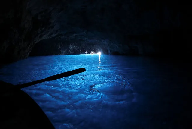 A general view of the Blue Grotto, one of the glamorous island of Capri's main tourist attractions that would have around 20-25 boats of people inside the cave during the summer season, but is instead empty and closed while the island awaits the return of tourists and the summer season despite the coronavirus disease (COVID-19), in Capri, Italy, April 28, 2021. (Photo by Yara Nardi/Reuters)