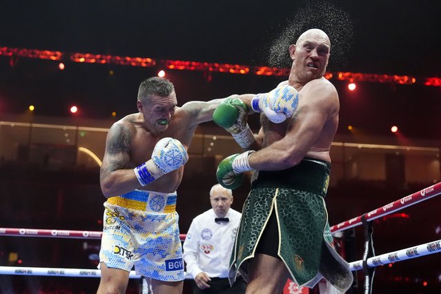 Oleksandr Usyk (left) lands a punch on Tyson Fury during the Heavyweight Championship fight at Kingdom Arena, Riyadh on Saturday, May 18, 2024. (Photo by Nick Potts/PA Images via Getty Images)