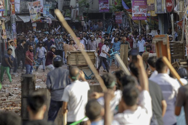 Clash between Anti-quota protesters and Bangladesh Chhatra League, the student wing of the ruling party Bangladesh Awami League in Dhaka. At Least five demonstrators were Killed in Bangladesh on July 16 during violent clashes between rival student groups over quotas for coveted government jobs, police said, a day after more than 400 others were injured. (Photo by K M Asad/LightRocket via Getty Images)