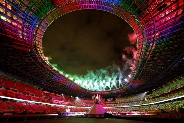 Fireworks light up the sky above the Olympic Stadium during the closing ceremony for the Tokyo 2020 Paralympic Games in Tokyo on September 5, 2021. (Photo by Issei Kato/Reuters)
