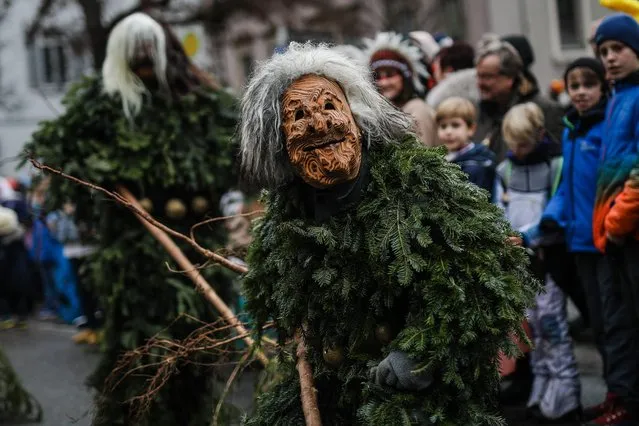 Reveller in carnival costumes parade on January 19, 2020 in Bad Cannstatt, near Stuttgart, southern Germany. (Photo by Christoph Schmidt/dpa/AFP Photo)