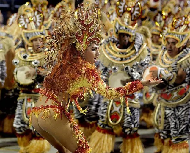 A dancer from the Mocidade Alegre samba school performs in Sao Paulo