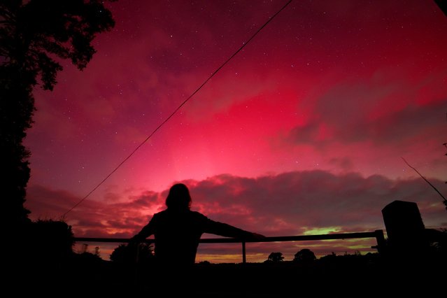 Northern Lights shine colourfully and brightly over Doddiscombsleigh, Devon, UK on October 10, 2024. Aurora Borealis watched by Neil Porter. (Photo by nidpor/Alamy Live News)