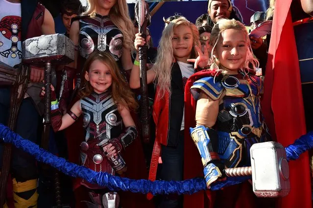 Fans in costume attend the premiere of “Thor: Love and Thunder” on Thursday, June 23, 2022, at the El Capitan Theatre in Los Angeles. (Photo by Jordan Strauss/Invision/AP Photo)