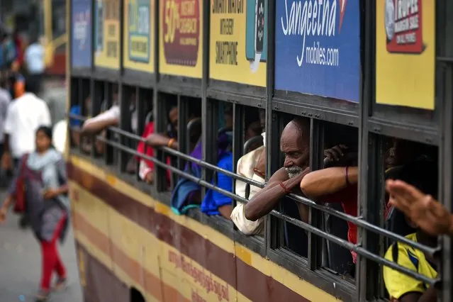 A passenger travels in a public transport bus without wearing a face mask at the Broadway bus terminus amid a sharp surge in the COVID-19 cases in Chennai, India, 28 June 2022. The state government of Tamil Nadu has announced the wearing of face masks mandatory yet again following a sharp rise in the daily COVID-19 cases in the state as 1,472 cases were registered in the last 24 hours. The state health department in a press release said that it would start collecting fines under the Tamil Nadu Public Health Act 1939, from those who are not wearing face masks and not following COVID-19 measures in the public places. (Photo by Idrees Mohammed/EPA/EFE)