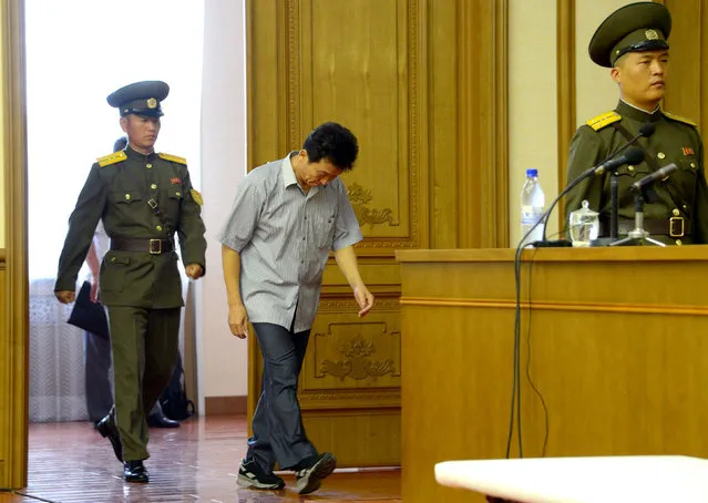 Ko Hyon-chol, who has been arrested for conspiring with South Korea's spy agency, attends a news conference at the People's Palace of Culture in Pyongyang in this picture provided by KCNA in Pyongyang on July 15, 2016. Ko’s arrest in North Korea was covered by a report from AFP, which said “Ko Hyon-Chol, 53, ‘confessed’ to attempting to kidnap two North Korean girl orphans and take them to the South”. During a press conference held in Pyongyang attended by foreign media and diplomats, Ko said he was introduced to agents from South Korean’s spy agency in December 2015. According to the report, Ko was told in May to “arrange the kidnapping of orphans from North Korea” with the National Intelligence Service (NIS) promising to paying $10,000 for each abductee. (Photo by KCNA/Reuters)