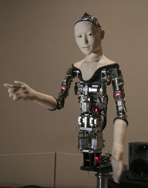 The humanoid robot “Alter” is displayed at the National Museum of Emerging Science and Innovation in Tokyo, Monday, August 1, 2016. Alter, jointly developed by two laboratories studying artificial life, led by Prof. Hiroshi Ishiguro at Osaka University and Prof. Takashi Ikegami at the University of Tokyo, shows human-like movements of arms, fingers, the upper torso and its head as well as facial expressions, to make visitors feel the android looks more human than an actual human. The exhibition runs until Aug. 6. (Photo by Koji Sasahara/AP Photo)