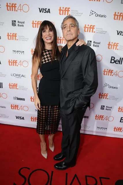 Sandra Bullock and Executive Producer George Clooney seen at The Toronto International Film Festival's special presentation of Warner Bros. Pictures' drama OUR BRAND IS CRISIS, co-hosted by Audi, on Friday, September 11, 2015, in Toronto, CAN. (Photo by Eric Charbonneau/Invision for Warner Bros./AP Images)