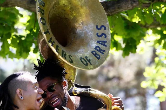 Armando Lopez and Khalil Brass, of the Brothers of Brass band, perform during an event to mark Juneteenth, which commemorates the end of slavery in Texas, two years after the 1863 Emancipation Proclamation freed slaves elsewhere in the United States, amid nationwide protests against racial inequality in Civic Center Park in Denver, Colorado, U.S., June 20, 2020. (Photo by Kevin Mohatt/Reuters)
