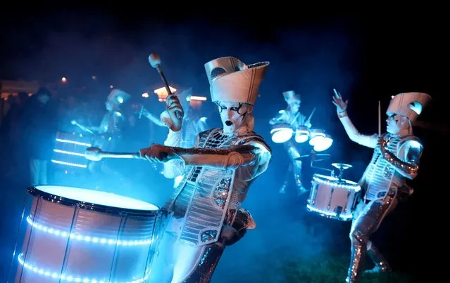 Street performers LED Spark Drummers perform at the South Shields and Westoe Rugby club in South Shields, Britain on November 4, 2022. (Photo by Lee Smith/Reuters)