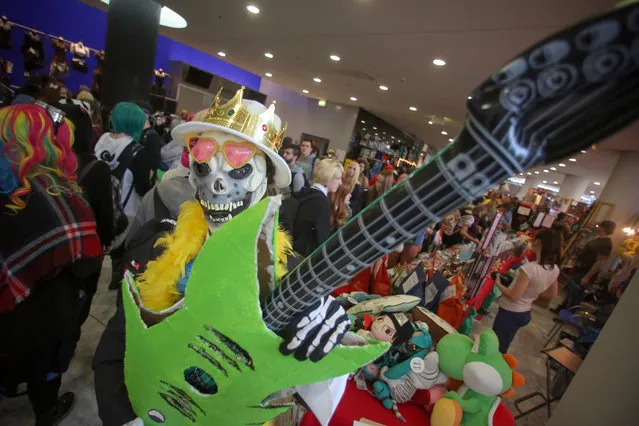 A cosplayer dressed as "Brook" (Comic One Piece) visits the comic- and cosplay hall at the Frankfurt Book Fair on October 17, 2015 in Frankfurt am Main, western Germany. (Photo by Fredrik von Erichsen/AFP Photo/DPA)