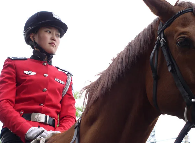 Dalian's famous Female Mounted Police Force, established 1994. (Photo by Tom Carter/The Atlantic)