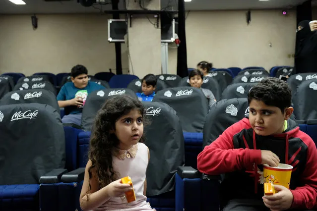 Children are seen inside the first Saudi Arabia cinema in Jeddah, Saudi Arabia on January 15, 2018. (Photo by Reem Baeshen/Reuters)