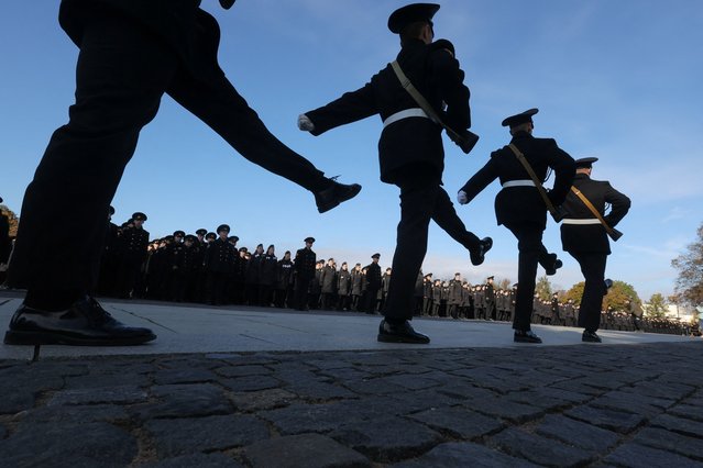 First-year cadets of a maritime technical academy attend a ceremony to take an oath in the naval port of Kronstadt located outside Saint Petersburg, Russia, on October 3, 2025. (Photo by Anton Vaganov/Reuters)