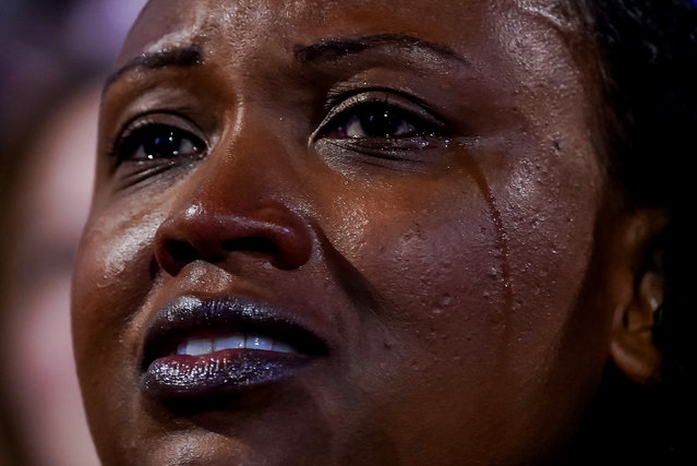 An attendee reacts during the final night of the Democratic National Convention (DNC) at the United Center in Chicago, Illinois, USA, 22 August, 2024. The 2024 Democratic National Convention is being held from 19 to 22 August 2024, during which delegates of the United States' Democratic Party will vote on the party's platform and ceremonially vote for the party's nominee for president, Vice President Kamala Harris, and for vice president, Governor Tim Walz of Minnesota, for the upcoming presidential election. (Photo by Will Oliver/EPA/EFE)