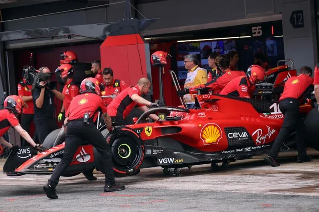 Ferrari's Monegasque driver Charles Leclerc gets in the box during the qualifying session for the Spanish Formula One Grand Prix at the Circuit de Catalunya on June 3, 2023 in Montmelo, on the outskirts of Barcelona. (Photo by Nacho Doce/Pool via AFP Photo)