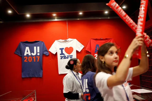 T-shirts advertising for the French politician Alain Juppe, current mayor of Bordeaux, a member of the conservative Les Republicains political party and candidate for their center-right presidential primary, are displayed at a campaign rally in Paris, France, November 14, 2016. (Photo by Benoit Tessier/Reuters)