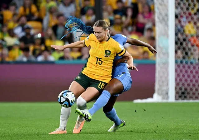 Kadidiatou Diani of France and Clare Hunt of Australia compete for the ball during the FIFA Women's World Cup Australia & New Zealand 2023 Quarter Final match between Australia and France at Brisbane Stadium on August 12, 2023 in Brisbane, Australia. (Photo by Dan Peled/Reuters)
