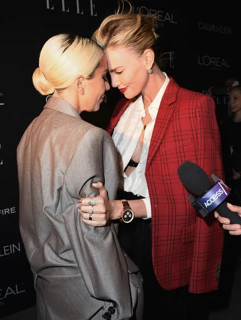 Lady Gaga and Charlize Theron attend the 25th Annual ELLE Women In Hollywood Celebration at Four Seasons Hotel Los Angeles at Beverly Hills on October 15, 2018 in Los Angeles, California. (Photo by Jon Kopaloff/FilmMagic)