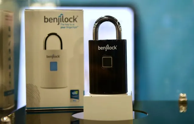 The BenjiLock, which uses a fingerprint to secure and supports up to four different fingerprints saving them in an encrypted chip for easy access, is displayed at the 2017 Consumer Electronic Show (CES) in Las Vegas, Nevada, January 6, 2017. (Photo by Frederic J. Brown/AFP Photo)