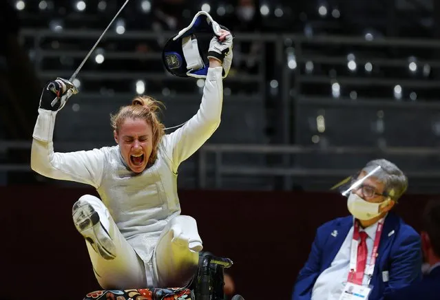 Eva Andrea Hajmasi of Hungary celebrate after winning the wheelchair fencing bronze medal match of the women's foil team between Hungary and Hong Kong of the Tokyo 2020 Paralympic Games at Makuhari Messe Hall in Chiba, Japan, on August 29, 2021. (Photo by Bernadett Szabo/Reuters)