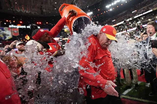 Kansas City Chiefs head coach Andy Reid is splashed after the NFL Super Bowl 58 football game against the San Francisco 49ers, Sunday, February 11, 2024, in Las Vegas. The Chiefs won 25-22. (Photo by Ashley Landis/AP Photo)