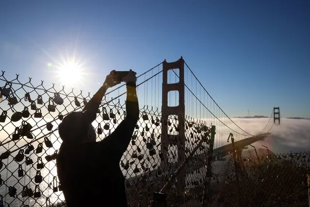 Sunrise view with foggy morning over San Francisco Golden Gate Bridge is seen from the Marin Headlands in Sausalito, California, United States on October 28, 2021. (Photo by Tayfun Coskun/Anadolu Agency via Getty Images)