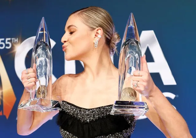Kelsea Ballerini, winner for Musical Event of the Year and winner for Music Video of the Year poses with her awards for the 55th annual Country Music Association awards at the Bridgestone Arena on November 10, 2021 in Nashville, Tennessee. (Photo by Harrison McClary/Reuters)