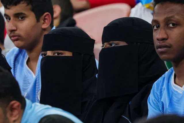 Spectators watch the FIFA Club World Cup football semi-final match between England's Manchester City and Japan's Urawa Red Diamonds at King Abdullah Sports City in Jeddah on December 19, 2023. (Photo by Giuseppe Cacace/AFP Photo)