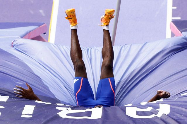 Makenson Gletty of France is swallowed up by the soft landing pad after his pole vault attempt in the men’s decathlon at Stade de France ib Saint-Denis, France on August 03, 2024. (Photo by Alina Smutko/Reuters)