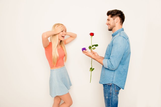 Happy man asking his girlfriend to marry him. (Photo by Roman Samborskyi/Rex Features/Shutterstock)