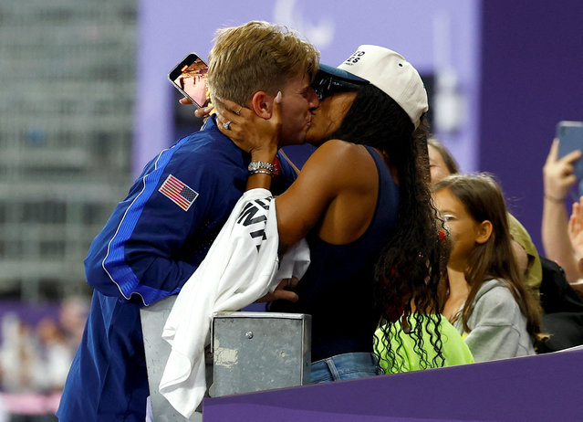 Gold medalist Fleur Jong of the Netherlands celebrates with his partner, gold medalist at the 2024 Summer Olympics Tara Davis-Woodall at the men's 400m T62 medal ceremony on September 6, 2024. (Photo by Thomas Mukoya/Reuters)