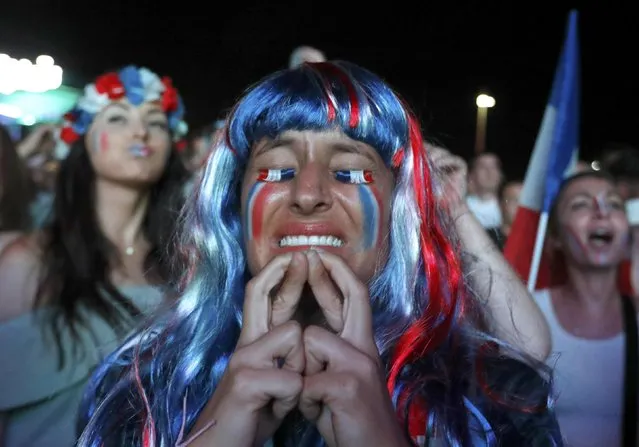 France supporters react during the France v Romania EURO 2016 Group A soccer match, at a fan zone in Marseille, France, June 10, 2016. (Photo by Yves Herman/Reuters)
