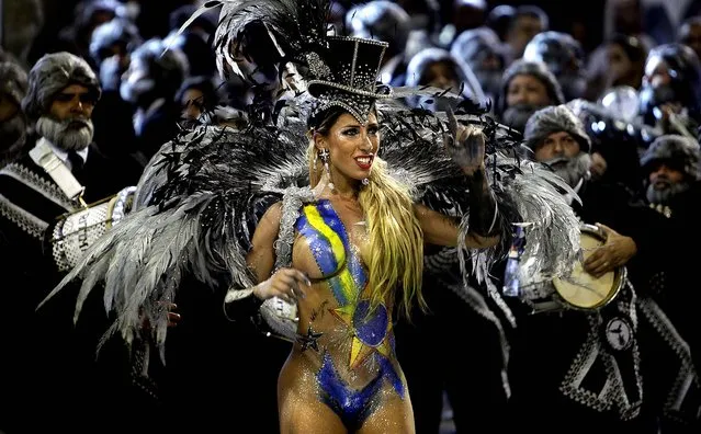 A dancer of the Gavioes da Fiel samba school performs in Sao Paulo