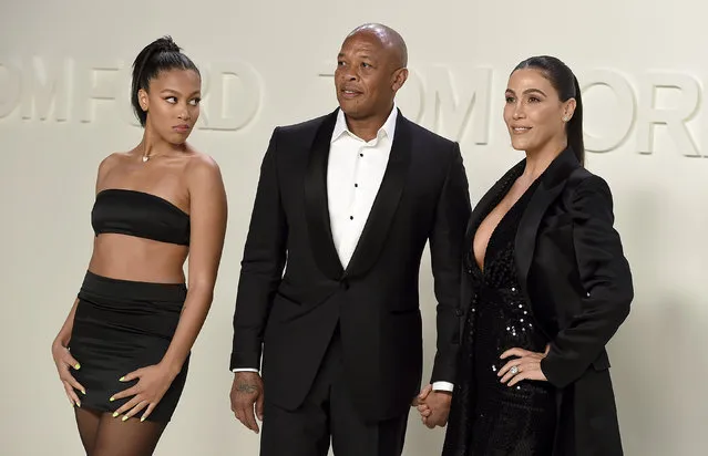 From left, Truly Young, Dr. Dre, and Nicole Young attend the Tom Ford show at Milk Studios during NYFW Fall/Winter 2020 on Friday, February 7, 2020, in Los Angeles. (Photo by Jordan Strauss/Invision/AP Photo)