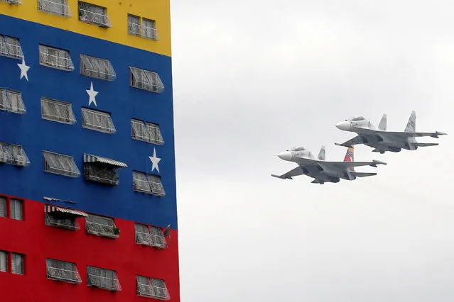 Two Sukhoi Su-30 from the Venezuelan Air Force take part during a military parade to celebrate the 205th anniversary of Venezuela's independence in Caracas, Venezuela July 5, 2016. (Photo by Carlos Jasso/Reuters)