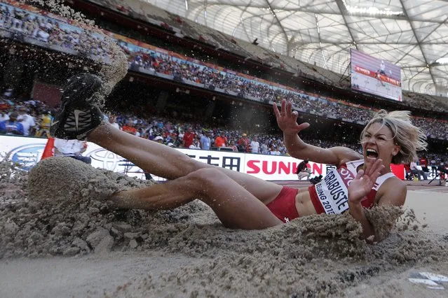 Latvia's Aiga Grabuste competes in the qualifying round of the women's long jump athletics event at the 2015 IAAF World Championships at the “Bird's Nest” National Stadium in Beijing on August 27, 2015. (Photo by Adrian Dennis/AFP Photo)