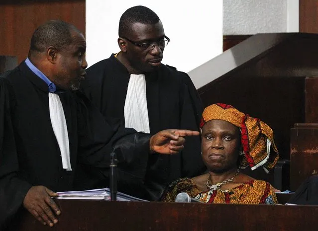 Ivory Coast former first lady Simone Gbagbo (R) during her trial at the Abidjan Justice Court, Ivory Coast, 19 July 2016. The 67 year old Simone Gbagbo is on trial facing allegations of crimes against prisoners of war, crimes against the civilian population and crimes against humanity for her role in post-election carnage in 2010. This is the second trial for Simone Gbagbo who has already been convicted in 2015 for offences against the state and sentenced to 20 years in prison over her role in post-election violence in 2010. (Photo by Legnan Koula/EPA)