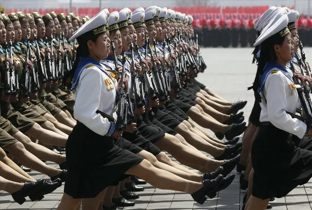 Soldiers march past the podium during a military parade to celebrate the centenary of the birth of North Korea's founder Kim Il-sung in Pyongyang April 15, 2012. (Photo by Bobby Yip/Reuters)