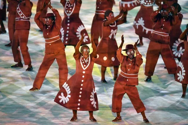 Dancers perform during the closing ceremony of the Rio 2016 Olympic Games at the Maracana stadium in Rio de Janeiro on August 21, 2016. (Photo by Fabrice Coffrini/AFP Photo)