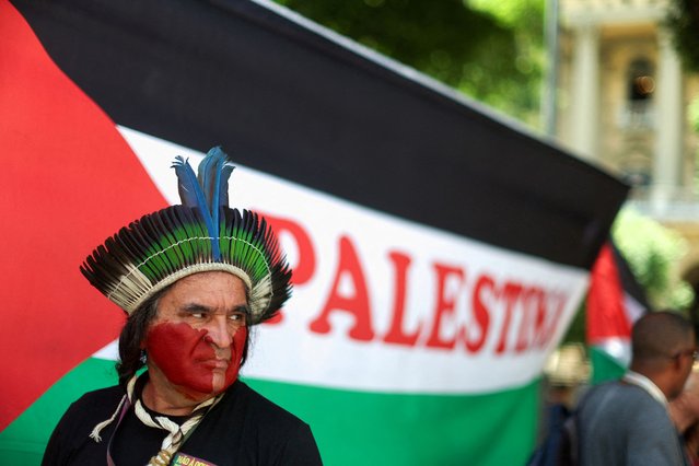 People take part in a pro-Palestinian demonstration, amid a meeting of foreign ministers as part of Brazil's presidency of the G20, in Rio de Janeiro, Brazil on February 22, 2024. (Photo by Pilar Olivares/Reuters)