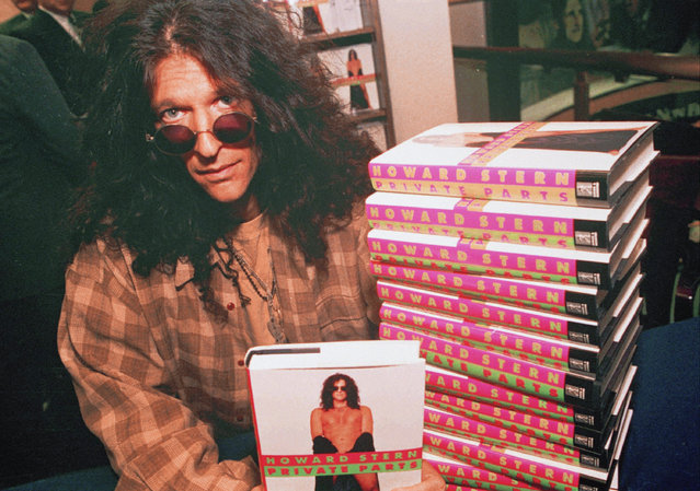 Radio Shock jock Howard Stern displays his book "Private Parts" at a book-signing appearance in Midtown Manhattan on Oct. 14, 1993. Stern's appearance attracted thousands of fans who jammed Fifth Avenue outside the Barnes and Noble bookstore where he appeared. (Photo by AP Photo)