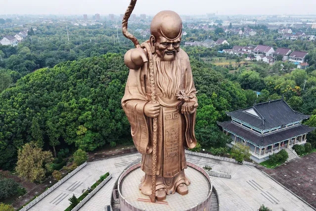 Aerial photo of the 49m-high bronze statue of “the oldest person in the world” in Rugao, Jiangsu Province, China, September 21, 2020. (Photo by Costfoto/Barcroft Media via Getty Images)
