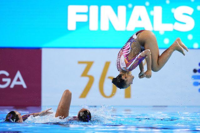 Team United States compete in the team free final of artistic swimming at the World Aquatics Championships in Singapore, Sunday, July 20, 2025. (Photo by Vincent Thian/AP Photo)