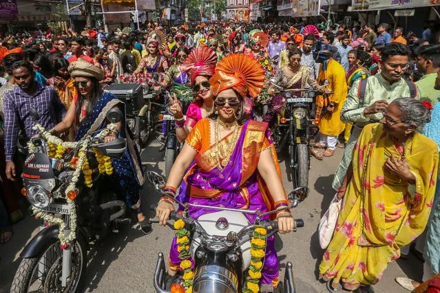 People in traditional clothes take part in a procession to celebrate the Gudi Padwa, Maharashtrian's New Year in Mumbai, India, 22 March 2023. Gudi Padwa is the Hindu festival that falls on the first day of Chaitra month and marks the beginning of the Lunar Calendar, which dictates the dates for all Hindu festivals, also known as Panchang. (Photo by Divyakant Solanki/EPA/EFE/Rex Features/Shutterstock)