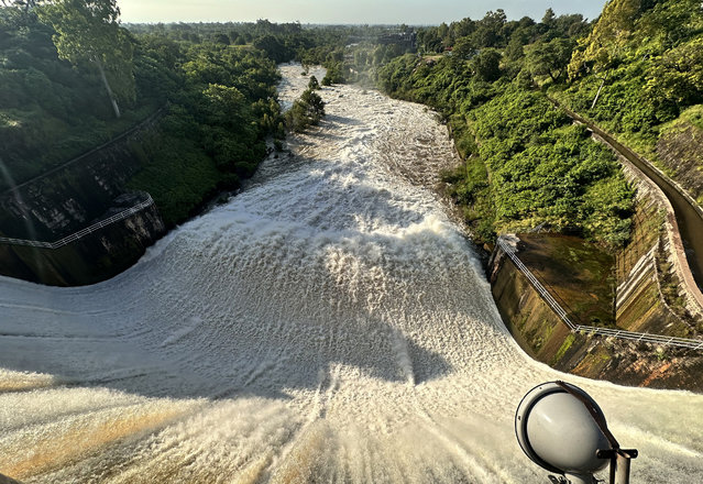 Water flows through open spillways of Rawal Dam after torrential monsoon rains in Islamabad, Pakistan, 02 September 2025. At least 33 people have died, and more than 1.4 million have been affected in Pakistan’s Punjab province after heavy monsoon rains, melting glaciers, and water releases from Indian dams caused three rivers to overflow, triggering severe flooding and 'exceptionally high' water levels, officials said. (Photo by Sohail Shahzad/EPA)