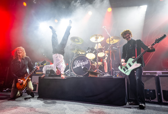 Dan Hawkins, Justin Hawkins and Frankie Poullain of The Darkness perform at The Fillmore on November 13, 2025 in San Francisco, California. (Photo by Steve Jennings/Getty Images)